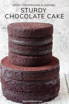 a stack of chocolate cakes sitting on top of each other