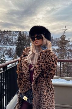 SNOWY ESCAPE 🌨️ @lisa_opie in our Brown Leopard Faux Fur Maxi Coat 🐆 Tap to shop 🔗