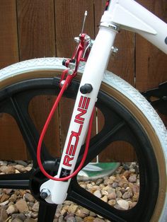 a close up of a bike tire and spokes