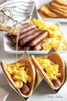 breakfast tacos with eggs, sausage and syrup