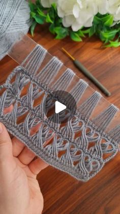 the video shows how to make a crochet lace ribbon