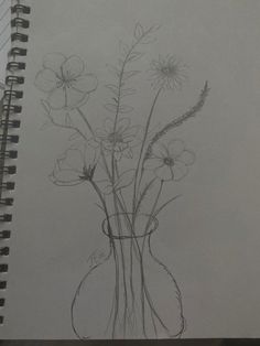 a drawing of some flowers in a vase