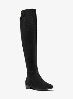 Designed in an over-the-knee silhouette our Bromley boot nods to chic equestrian style. Its stretch construction and side zip fastening render it easy to wear while a slight heel ensures day-long comfort. Balance the ultra-sleek feel with the season’s Bohemian midi dresses. Sleek Black Knee-high Boots For Fall, Modern Black Knee-high Winter Boots, Medium Width Tall Knee-high Boots For Winter, Midi Dress Boots, Long Winter Boots, Black Medium Width Knee-high Boots, Modern Black Knee-high Boots Medium Width, Over The Knee Boot Outfit, Michael Kors Boots