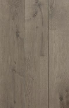 an image of wood flooring that looks like it has been painted in grey tones