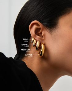 Chubby Medium Hoop Earrings | 18ct Gold Vermeil. A Lightweight Version of Our Everyday Icon. Bold, Chunky, and Versatile these Medium-Sized Hoops are a Standout Style You Can Easily Wear Day to Night. Create Contrast in Your Ear Stack by Teaming with Delicate Huggies or Mixing Metals. Also Available in Mini, Small and Large. Metal: 18Ct Gold Plated Vermeil on Recycled 925 Sterling Silver Hoop Thickness: 7mm Hoop Diameter: 26mm Weight: 7. 9g Product Code: Ch-G-E7-Ns Gold And Silver Earrings, Mixing Metals, Medium Hoop Earrings, Earring Trends, Mini Hoop Earrings, Ear Stack, Small Hoop Earrings, Jewelry Aesthetic, Large Hoop Earrings