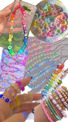 several different types of bracelets are shown in this image, and one is being held up