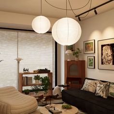 a living room filled with furniture next to a large window covered in white shades and hanging lights