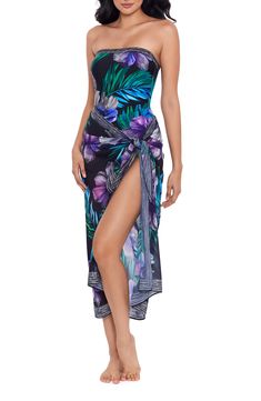 A gorgeous print amplifies the breezy vibe of a resort-ready pareo that may be tied as a sultry skirt or cover-up dress. Tie closure 100% polyester Hand wash, line dry Imported Elegant Tie-side Bottom Swimwear For Vacation, Floral Print Sarong For Beach Cover-up, Elegant Tie-side Swimwear For Vacation, Floral Print Wrap Beachwear Cover-up, Floral Print Sleeveless Swimwear For Beach Cover-up, Floral Print Sleeveless Beach Cover-up Swimwear, Beachwear Sarong With Tie Waist, Elegant Summer Vacation Sarong, Chic Tropical Print Swimwear For Beach Season