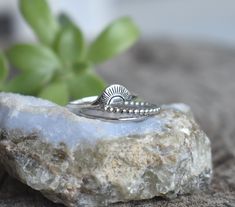 "Sun Rays Ring: -Solid .925 sterling silver -5mm Sun design on 1.2mm band -Comfortable and easily stackable! -US sizes 4-12.5 with half sizes -Set of 3 includes 1mm smooth band and 1.5mm bead band. Other rings shown here: https://www.etsy.com/shop/AWildViolet?ref=seller-platform-mcnav&section_id=13958646 Looking for a last minute or unique Christmas gift? Visit our \"READY TO SHIP\" section here, ships out in one business day https://www.etsy.com/shop/AWildViolet?section_id=23587515 Connect with Ouroboros Jewelry, Sunset Ring, Leo Ring, Sun Jewelry, Silversmithing Jewelry, Mood Stone, Sun Ring, Celestial Ring, Snake Ring Silver