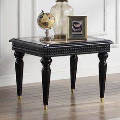 The Tayden End Table with Marble Top in Marble Top & Black Finish is the perfect addition to any living room. The end table features a beautiful marble top that provides a luxurious and elegant look, and the black finish on the base creates a sleek and chic appearance. The end table is designed with both style and functionality in mind. The sturdy and durable base is built to last, and the marble top is easy to clean and maintain, ensuring that your end table always looks its best. The compact s Marble Accent Table, Table With Marble Top, Hair Salon Interior, Table With Marble, Rattan Side Table, Table Marble, Wood End Table, Drum Table, White Carpet