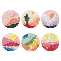 four round mosaics with different colors and designs on them, each featuring a cactus