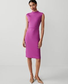 Elevate your wardrobe with the Ann Taylor Ponte Mock Neck Sheath Midi Dress, a stunning blend of style and comfort. This dress is perfect for any season with its vibrant Fresh Fuchsia shade and flattering silhouette.

- Size: 16
- Color: Fresh Fuchsia
- Material: Shell - 66% Rayon, 30% Nylon, 4% Spandex; Lining - 100% Polyester
- Gender: Female
- Features: Mock neck, cap sleeves, hidden back zipper with hook-and-eye closure, back vent, lined bodice
- Length: 25" from natural waist
- Care Instruc Female Features, Petite Midi Dress, Sheath Midi Dress, Cute Work Outfits, Winter Shopping, Sleeveless Dresses, Figure Size, Midi Sheath Dress, Line Shopping