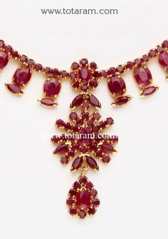 22 Karat Gold Ruby Necklace & Long Earrings Set with intricate workmanship. 
  Gross Gold Weight: 38.500 grams
  Ruby Weight: 30.00 Carats
  Length of Pendant : 1.60 inches 
  Width of Pendant : 0.70 inches 
  Width of the sides of Necklace: 0.40 inches
  Length of Earring : 1.50 inches
  Width of Earring : 0.50 inches
   - 235-GS1515 - in 38.500 Grams for USD $3628.49. 
Made in India by Totaram Jewelers Online this product is in Gold - 22 Karat BIS Hallmark 916 KDM Gold  & is an exce Ruby Light Weight Necklace, Ruby Necklace Designs Indian, Ruby Jewelry Necklaces Gold, Ruby Necklace Designs, Gold Ruby Necklace, Ruby Jewelry Necklaces, Queen Rings, Online Gold Jewellery, Gold Ring Designs