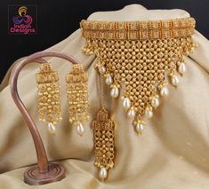 Exclusive design Indian traditional gold plated polki choker jewelry with earrings and maang tikka. Luxury Diwali Choker With Intricate Design, Luxury Gold Kundan Tikka, Luxury Gold Temple Necklace For Diwali, Luxury Traditional Necklaces For Festivals, Luxury Elegant Gold Tikka, Luxury Gold Elegant Tikka, Luxury Gold Ceremonial Tikka, Necklace Gold Design, Indian Choker Necklace Gold