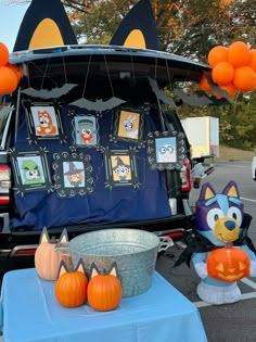 the trunk of a car is decorated with halloween decorations