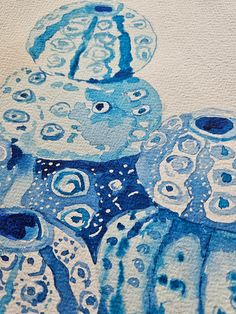 an octopus painting with blue and white colors