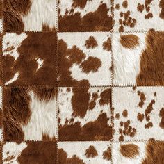 an animal print rug with brown and white spots