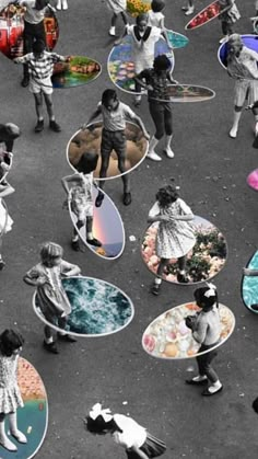 an aerial view of people carrying surfboards on their heads in the middle of a street