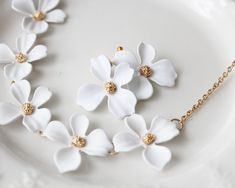 more Artsy and Sophisticated necklaces and earrings in DearDanielleJewelry: https://www.etsy.com/shop/DearDanielleJewelry?ref=seller-platform-mcnav&section_id=28433487 White wedding flower necklace. Bride necklace, Bridesmaid necklace. Spring and summer flower necklace. **framed gems and charms are gold plated which means you can have beautiful and trendy jewelries in more affordable price. *All the jewelry in my shop will be sent in cotton pouch. If you want gift box wrapping, please let us Gift Box Wrapping, Wood Hoop Earrings, White Flower Earring, Box Wrapping, Wedding Earring, Bride Necklace, Geometric Hoop Earrings, Earring Wedding, Cotton Pouch