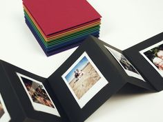 a group of pictures sitting on top of a white table