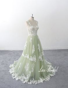 This is a customized product, please provide measurement and phone number when ordering. Thank you grass green dress lace wedding dress Sage Green wedding dress,  bohemian wedding dress shapewear wedding dress 1.As always, Custom Made(your own size, your preferred color). 2.I carefully select high-quality beads, pearls, fabrics and threads to create every dress. 3.For this style, I need: Color: sage color+ivory lining  as pictures) Height:  Bust:  Waist:  Hip:  Hollow to Floor:  Phone Number: Sh Wedding Dress Sage Green, Wedding Dress Shapewear, Sage Wedding Dress, Sage Green Wedding Dress, Shapewear For Wedding Dress, Dress Shapewear, Green Wedding Dress, Dress Sage Green, Green Wedding Dresses