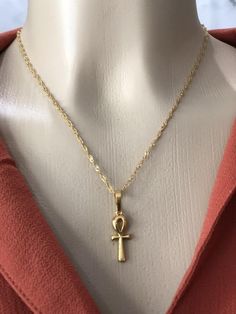 MINI ANKH NECKLACE 24k gold plated (COMES WITH 23 INCH CHAIN NECKLACE, you can request 18inch) COMES WITH EXTRA HIGH QUALITY 22 inch CUBAN CHAIN NECKLACE AS A BONUS.