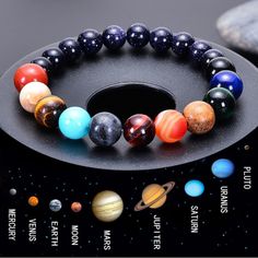 This bracelet is handmade from natural stones, which contains eight different colors of stones, corresponding to the eight planets in solar system.It is for Unisex, can wear on both women and men. When you wear it, You are the sun, all the eight planets revolve around you. Natural agate stone Bead diameter: 8 mm 10 mm Adjustable size - Suitable for hand circumference: 15-19 CM Handmade with love Hypoallergenic, lead & nickel free If you aren't in LOVE with your purchase, please let us know within 30 days of receiving your item, and you'll receive a stress-free refund. Solar System Bracelet, Bracelet Chakra, Universe Galaxy, Stone Bracelets, Men's Bracelets, Yoga Bracelet, Crystal Healing Stones, Chakra Jewelry, Bead Bangles