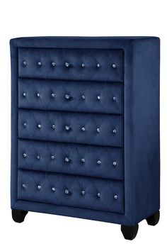 an image of a blue dresser with diamond buttons on the top and bottom drawer open