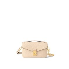 Pochette Métis East West Monogram Empreinte Leather - Women - Handbags | LOUIS VUITTON ® Pochette Metis East West, Lv Pochette Metis, Louis Vuitton Pochette Metis, Lv Pochette, Longchamp Bag, Womens Designer Bags, Compact Bag, Summer Shopping