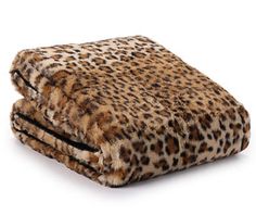 a leopard print blanket on top of a white background