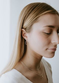 Introducing The Classic Hoops in Sterling Silver, for the silver girlies out there! These lightweight earrings are easy-peasy to wear, making them the perfect accessory for a night out that you don't want to take too seriously.∙ D E T A I LS ∙ - 925 Sterling Silver - Two sizes available : - 1mm x 20mm OR 2mm x 18mm ∙ STERLING ∙ SILVER ∙ Sterling silver is a metal alloy created by combining 92.5% pure silver with 7.5% other metals, typically copper. While Sterling Silver may darken due to oxygen exposure it can easily be polished without damaging the metal itself. You should even be able to pass your silver jewellery on to future generations! Adjustable Pierced Threader Earrings For Everyday, Adjustable Threader Earrings For Everyday, Dainty Everyday Threader Earrings, Everyday Minimalist Hoop Earrings, Hypoallergenic Sterling Silver Drop Threader Earrings, Everyday Teardrop Wrap Earrings, Hypoallergenic Drop Threader Earrings For Everyday, Hypoallergenic Threader Earrings For Everyday Wear, Hypoallergenic Everyday Threader Earrings