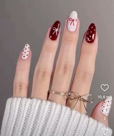 A chic minimalist nail design featuring delicate bows for a subtle yet stylish look. Christmas Nails With Nail Polish, Gel Nails With Bows, How To Paint Bows On Nails, Simple Gel Nails Christmas, Bow On Nails Design, Clean Holiday Nails, Beginning Of December Nails, Nails Bows Design, Maroon Bow Nails