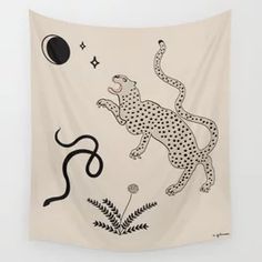 a wall hanging with a drawing of a cheetah and snake