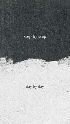 a black and white photo with the words, step by step day by day on it