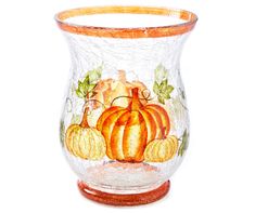 a glass vase with pumpkins painted on it