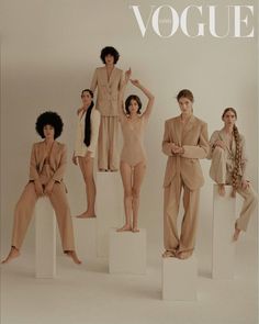 an advertisement for the new collection of women's clothing, featuring models in nude colored outfits