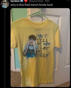 a yellow t - shirt with the words don't tell my mom is lost on it