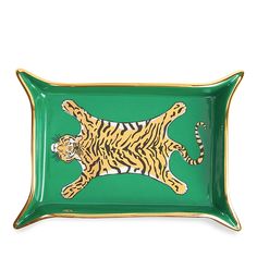 a green tray with a tiger on it