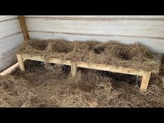 two wooden benches made out of hay