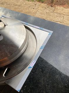 an old record player sitting on top of a table