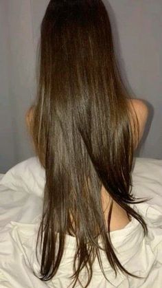 the back of a woman's head with long hair