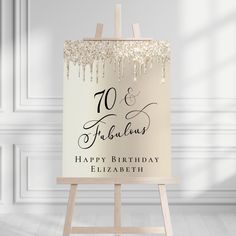 an easel with a happy birthday sign on it