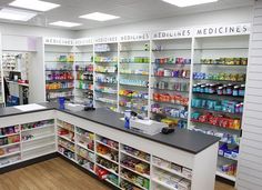 an empty pharmacy room filled with medicine supplies