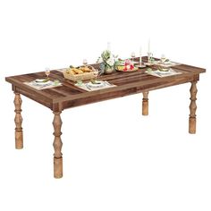 a wooden table topped with lots of food and wine glasses on top of each table