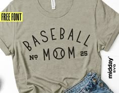 a t - shirt that says baseball mom on the front, and an image of a pair of jeans next to it