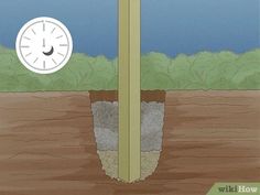 a clock sitting on top of a wooden pole in the middle of a dirt field