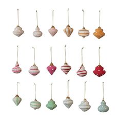 twelve ornaments hanging from strings in different colors