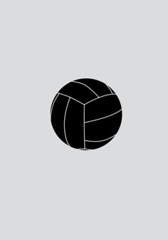 a black and white volleyball ball on a gray background