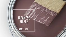 a paint can with a brush in it and the words japanese maple painted on it