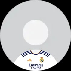 a white disc with an image of the real madrid jersey on it's side